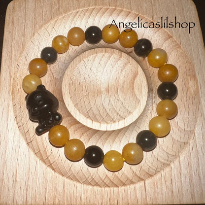 Pulsera Winnie the Pooh con aventurina amarilla y obsidiana plateada