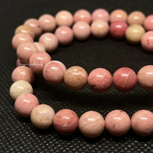 Pulsera de madera petrificada rosa (8 mm)